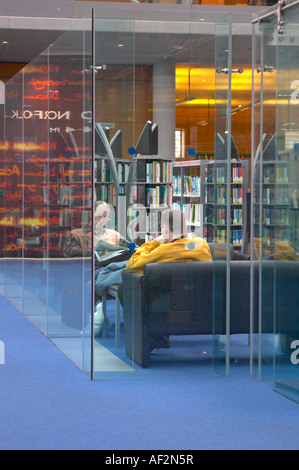 STUDYING, READING AND RELAXING AREA IN THE MILLENIUM FORUM LIBRARY,NORWICH,ENGLAND,UK, Stock Photo