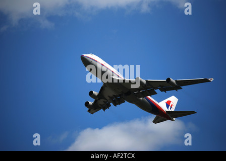 Malaysian Airlines Boeing 747-400 aircraft taking off from Heathrow Airport, Middlesex, England, United Kingdom Stock Photo