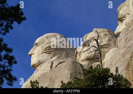A National Park Service ranger atop the head of George Washington in  Mount Rushmore National Memorial, South Dakota. Stock Photo