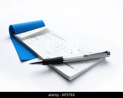 cheque book and pen Stock Photo