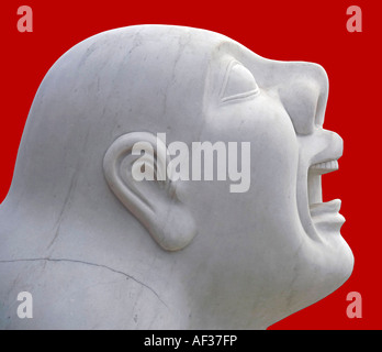 Detail of a chinese sculpture depicting a dog with the head of a man traditionally placed as guardians at compounds and palaces Stock Photo