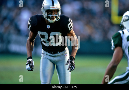 National Football League Hall of Famer Jerry Rice & New York Jets DB at Oakland Coliseum in California. © Craig M. Eisenberg Stock Photo