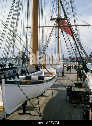 HMS Warrior Iron Clad warship 1860 with rigging flag and  traditional life boat Stock Photo