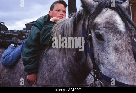 A boy with his horse on the Ballymun estate Dublin Stock Photo