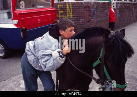 A boy with his horse on the Ballymun estate Dublin Stock Photo