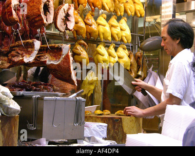 Butcher on a market in Hong Kong, China, Asia Stock Photo