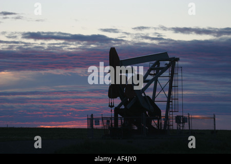 Oil and gas industry near the Canadian Rocky Mountains in Alberta, Canada, Stock Photo