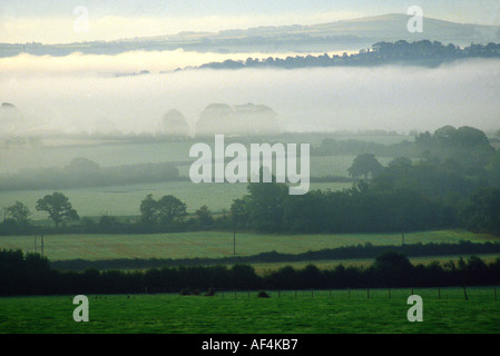 Early Morning River Fog Looking South Towards New Ross in County Wexford from County Kilkenny Ireland Stock Photo