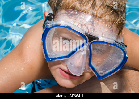 boy wearing diving mask by the poolside Stock Photo