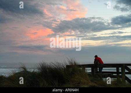 Man looking out to the horizon Stock Photo