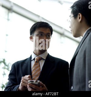 Two businessmen having discussion Stock Photo