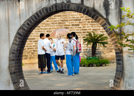 Beijing CHINA, Mixed Group of Chinese Teenagers Visiting in Garden at "Ancient Observatory » Monument  teenagers hanging out Stock Photo