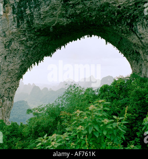 Landscapes World Travel. Landscape of Moon Hill In Yangshuo in Guilin Guangxi in East China in Asia. Adventure Culture Travel Far East Stock Photo