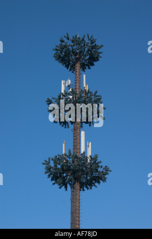 mobile phone antenna tower shaped like a tree Stock Photo