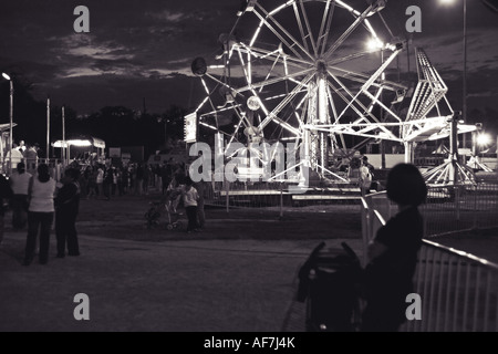 Lady by Ferris Wheel in Culver City West Los Angeles California USA Stock Photo