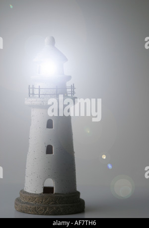 A Stock Photograph of a Lighthouse Shown in a Conceptual Still Life Way Stock Photo