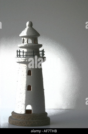 A Stock Photograph of a Lighthouse Shown in a Conceptual Still Life Way Stock Photo