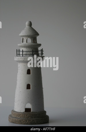 A Stock Photograph of a Lighthouse Shown in a Conceptual Still Life Way Stock Photo