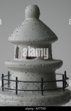 A Stock Photograph of a Lighthouse Shown in a Conceptual Still Life Way Stock Photo