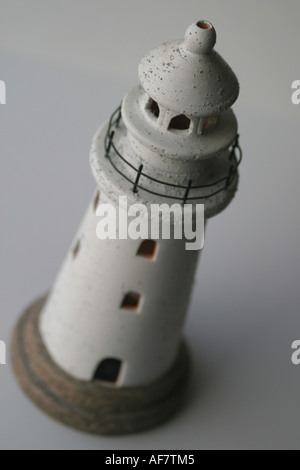 A Stock Photograph of a Lighthouse Shown in a Conceptual Still Life Way Stock Photo