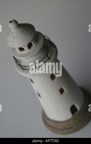 A Stock Photograph of a Lighthouse Shown in a Conceptual Still Life Way Stock Photo