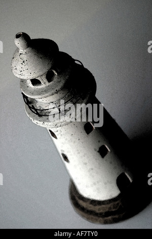 A Stock Photograph of a Lighthouse Shown in a Conceptual Still Life Way Stock Photo