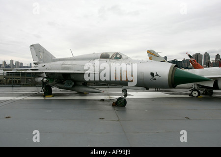 Polish air force Mig 21 PFM on display on the flight deck at the Intrepid Sea Air Space Museum new york city new york USA Stock Photo