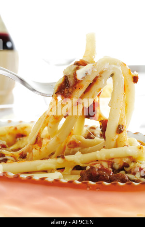 Macaroni casserole on fork, close-up Stock Photo