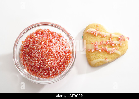 Heart-shaped biscuit with sugar pealrs Stock Photo