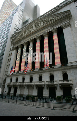 NYSE New York Stock Exhange in christmas holidays festive lights of american flag wall street new york city new york USA Stock Photo