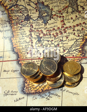 Gold Kruger Rand coins lying on an old map of South Africa South Africa Stock Photo