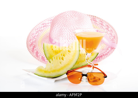 Summer hat, sunglasses and drink, close-up Stock Photo
