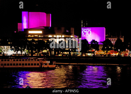 National Theatre, London, night time view from north bank (Victoria Embankment) of the River Thames