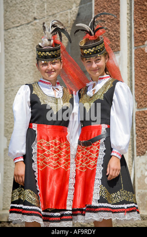 Two young girls in traditional Ukrainian costumes in Plotzk / Ukraine Stock Photo