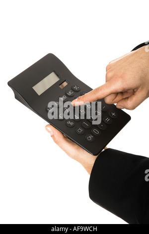 Man using calculator, close-up Stock Photo