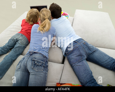 Family using laptop Stock Photo