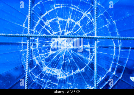 broken window with rusty security steel bars Stock Photo