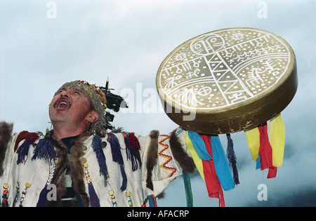 Shaman is performing ritual ceremony (kamlanie). El-Oiyn national festival of Altaic people. The Altai Republic. Russia Stock Photo