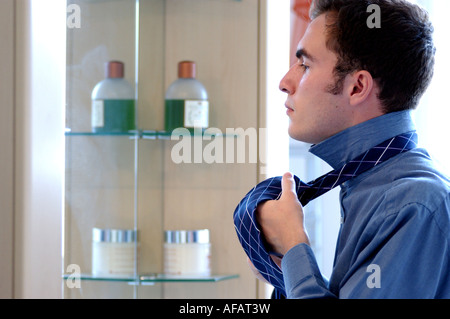 British young business man getting ready for first day new job and starting career in legal profession London UK Stock Photo