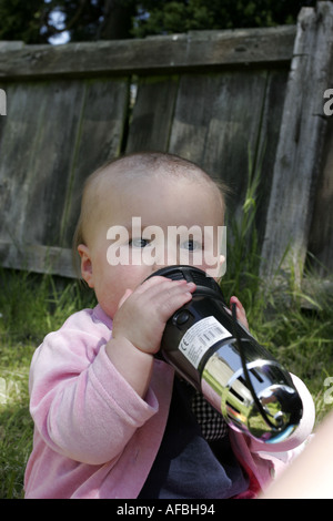 Baby girl with giant karaoke microphone Stock Photo