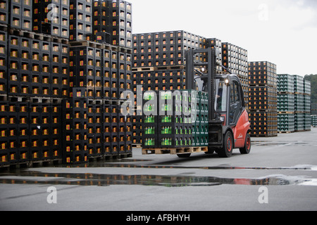 Brauerei C A Veltins GmbH und Co Fork truck on the depot for the empties Stock Photo