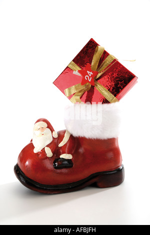 Santa boot with christmas parcel Stock Photo