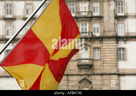 Yellow and red flag flies in front of the Convent of Santa Clara, Vila do Conte, Northern Portugal Stock Photo