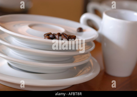 Saucers and coffee beans, close-up Stock Photo