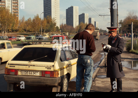 Moscow Russia,Eastern Europe European,Russian Federation,traffic patrol,warden,writes ticket,stopped motorist,Rus031 Stock Photo