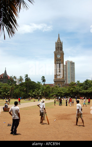 Children playing cricket on Oval Maiden in Mumbai, India Stock Photo