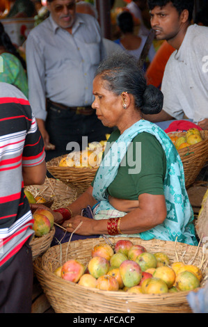 Indian woman at market stall in Panaji, Goa Stock Photo