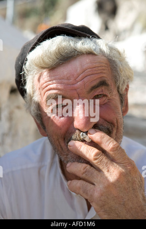 Smoking Greek Man, Fira, Santorini, Greece Stock Photo