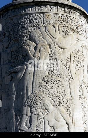 Detail of a low relief from Paul Landowski - the city and country pleasures - fountain on Porte de St Cloud square in Paris Stock Photo