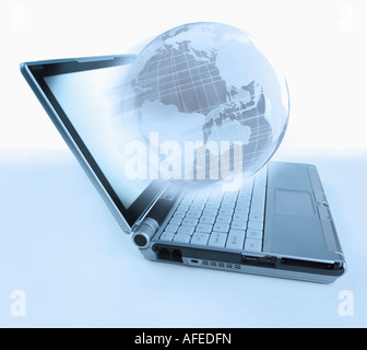 A computer keyboard connected to a globe Stock Photo - Alamy